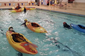 Towing kayaks in pool
